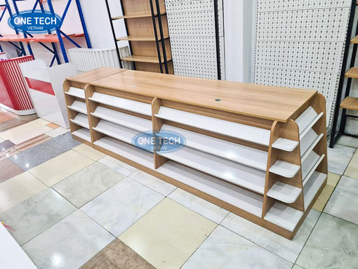 Quầy thu ngân chữ I bằng gỗ công nghiệp sang trọng và tiện dụng Quầy thu ngân gỗ công nghiệp chữ I thiết kế hiện đại, phù hợp cho cửa hàng bán lẻ