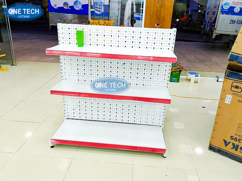Cấu tạo chi tiết của kệ tôn đục lỗ siêu thị Ảnh minh họa cấu tạo kệ tôn đục lỗ với các bộ phận chính như chân trụ, mâm kệ, ốc vít và lưng kệ đục lỗ