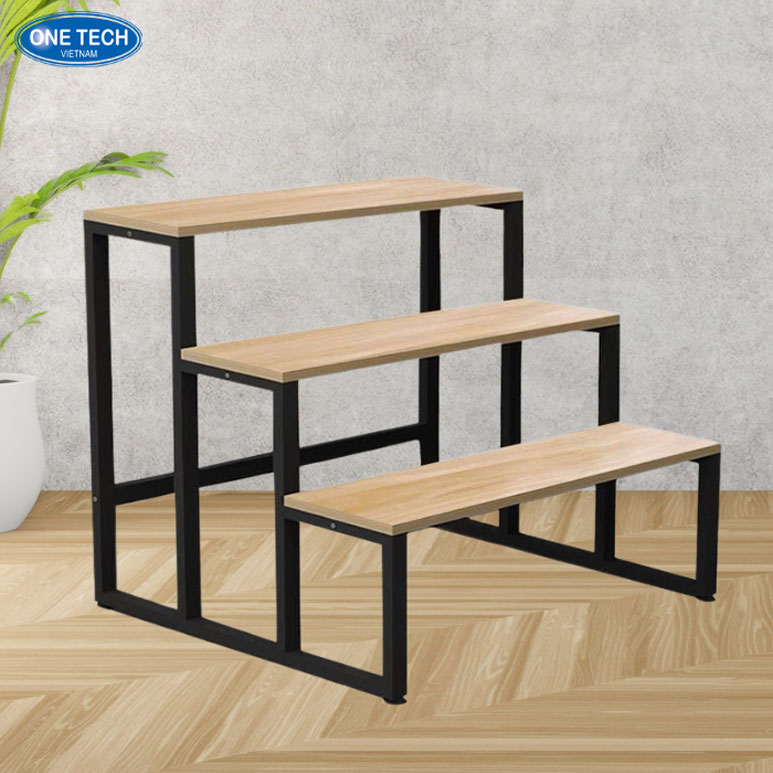 Kệ sắt phối gỗ hình bậc thang trưng bày hàng hóa hiện đại Kệ sắt phối gỗ hình bậc thang 3 tầng dùng trưng bày sản phẩm trong siêu thị hoặc cửa hàng